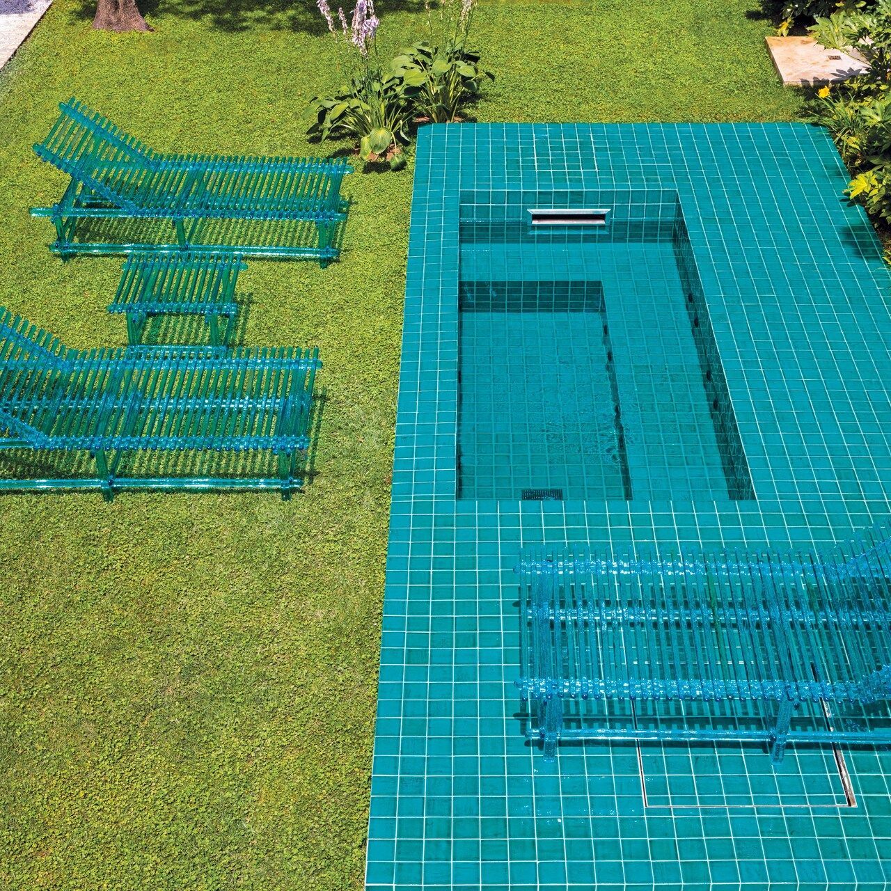   A'mare . The sun beds and the pool table. 