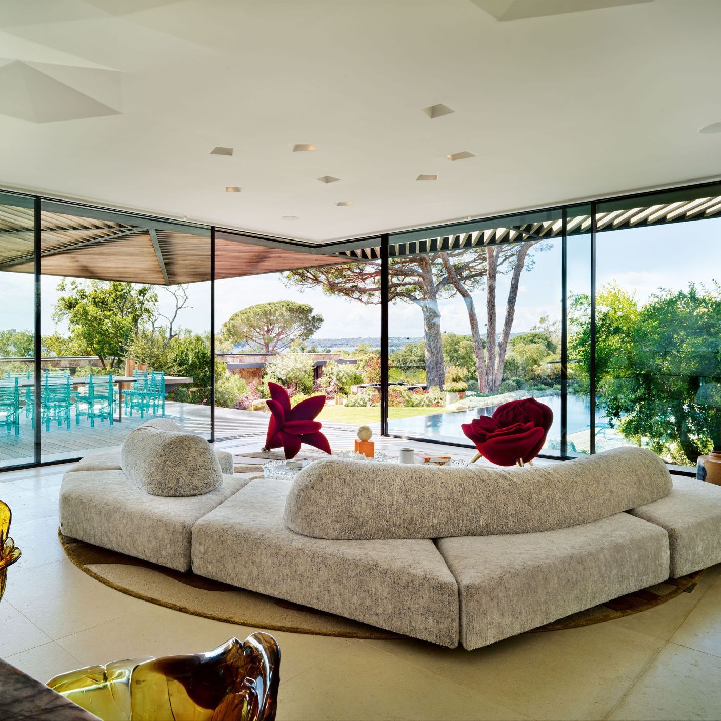  On the Rocks, Flowers Collection, Ella and A&rsquo;mare. The centre stage sofa is an invitation to sharing and contemplation. On the right of the fireplace is the Gravity Candle Holder by Atelier Fig. 
