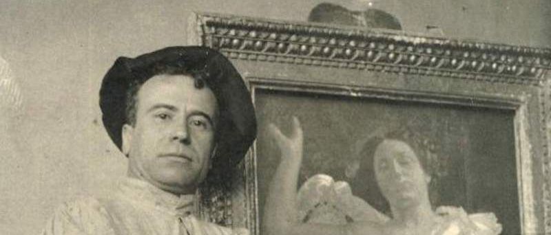  Icilio Federico Joni. Il pittore ritratto di fronte a una delle sue opere. 