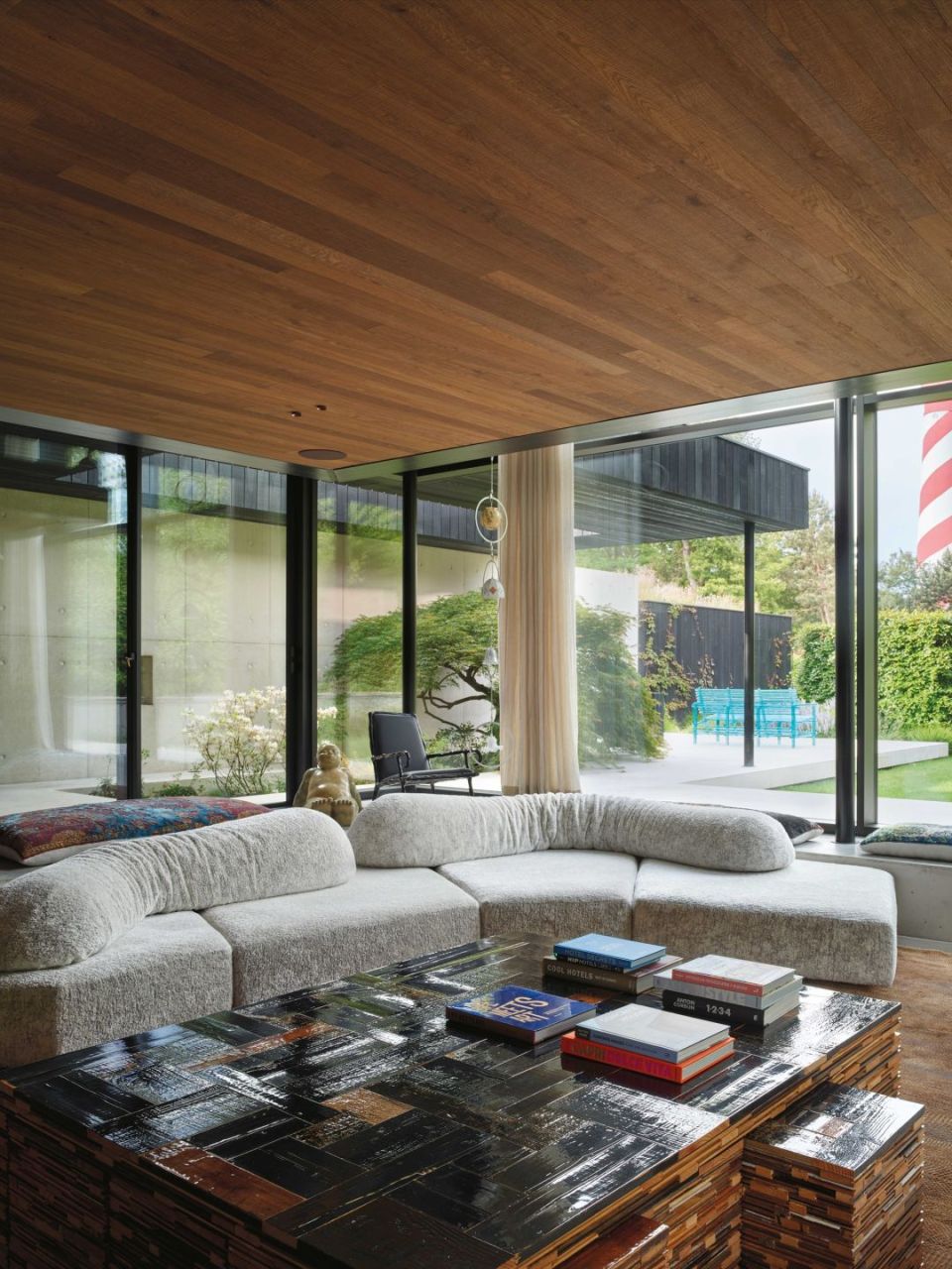   On the Rocks. &nbsp;The sofa opens up a 360-degree view of the landscape in the villa&rsquo;s living area. Artworks by Maarten Baas, Piet Hein Eek and Anton Gaud&igrave;. 