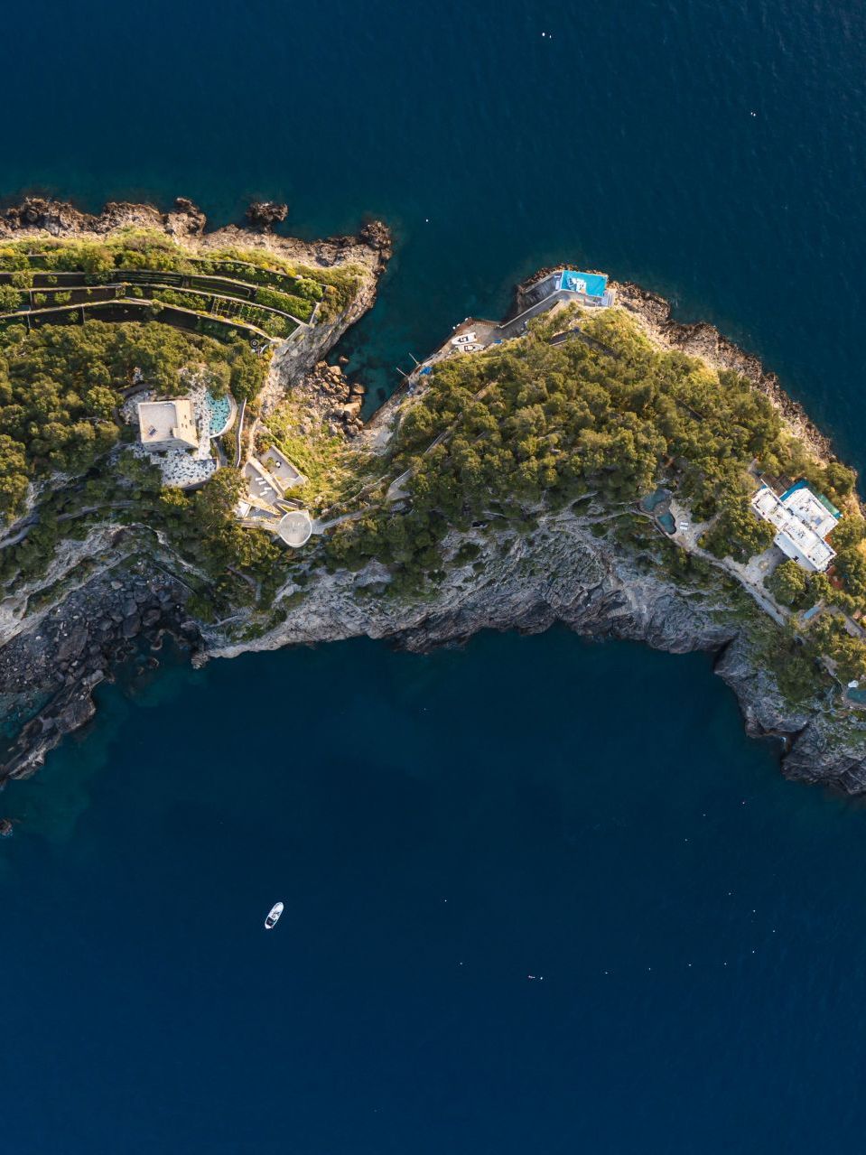  The Li Galli archipelago. Aerial view of the three islets called Gallo Lungo, the largest, with the silhouette of a dolphin, La Rotonda and La Castelluccia. 